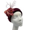 Burgundy Halo crown with orchid flower & feather detail.